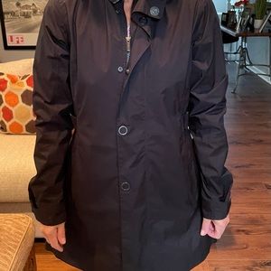 REI ladies black rain jacket. never worn